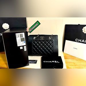 Chanel Mademoiselle Shopping Bag in large black lambskin & in silver hardware.